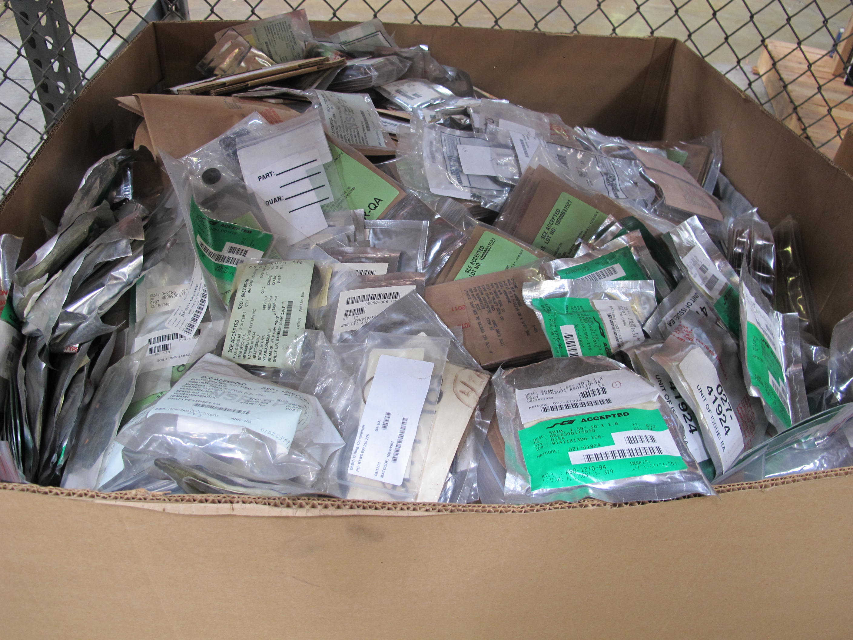 LOT TO INCLUDE TO INCLUDE BUT NOT LIMITED TO: (2 PALLET SIZED BOXES) MISC. GASKETS, SHIMS, O-RINGS, AND PACKING, (1) PALLET OF CHESTERTON, JOHN CRANE, AND GARLOCK BULK MECHANICAL PACKING. LOADING & HANDLING FEE $15-4214